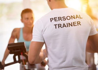 Personal trainer on training with  client